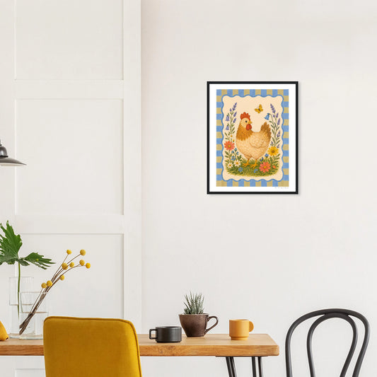 Framed artwork of a rooster on a wall above a table with chairs.
