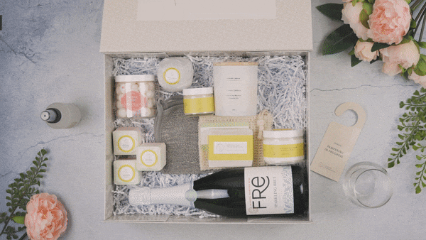 DC-Lizush congratulations gift basket with assorted treats and festive decorations in a celebration gift box.