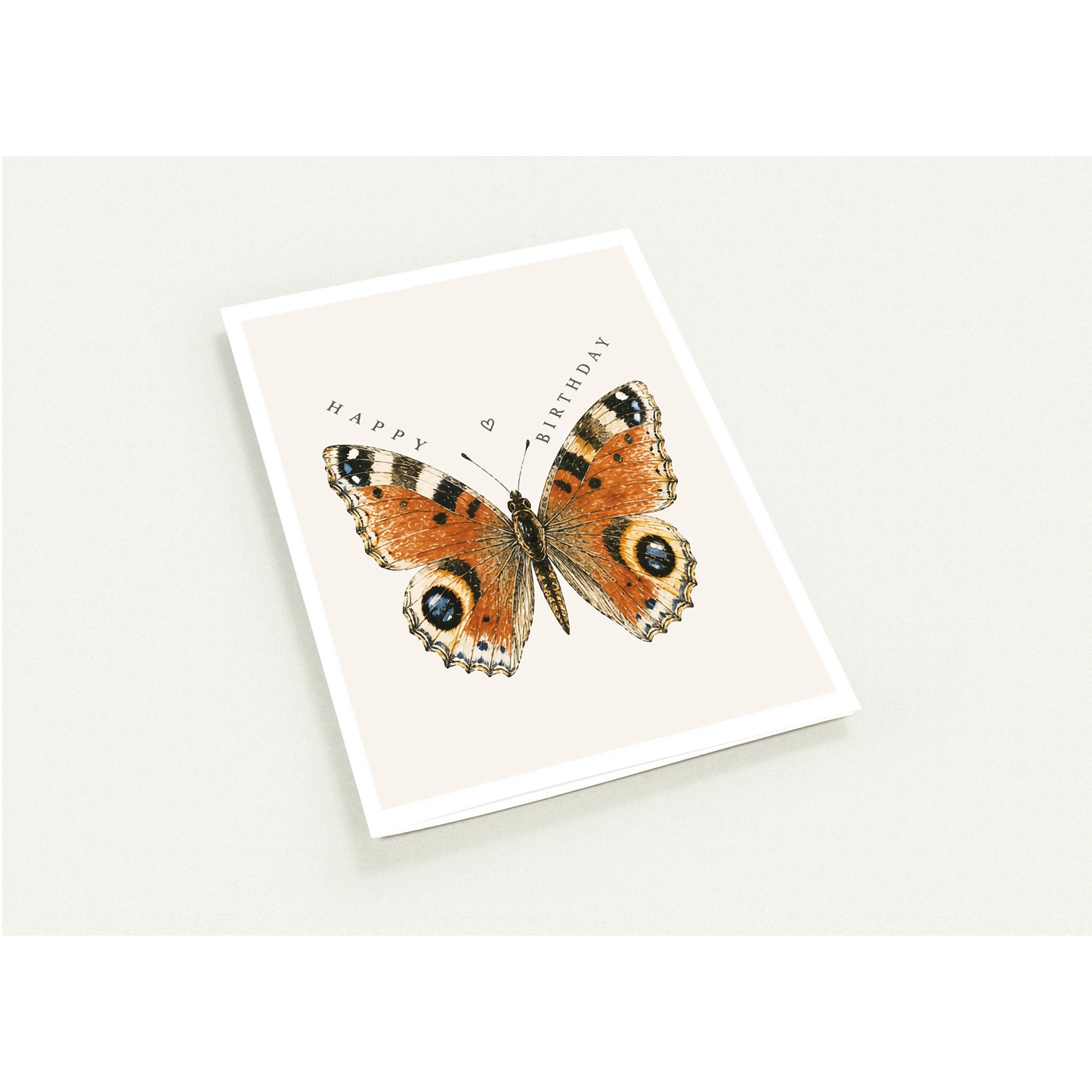 Greeting card with a butterfly illustration and 'Happy Birthday' text on a white background