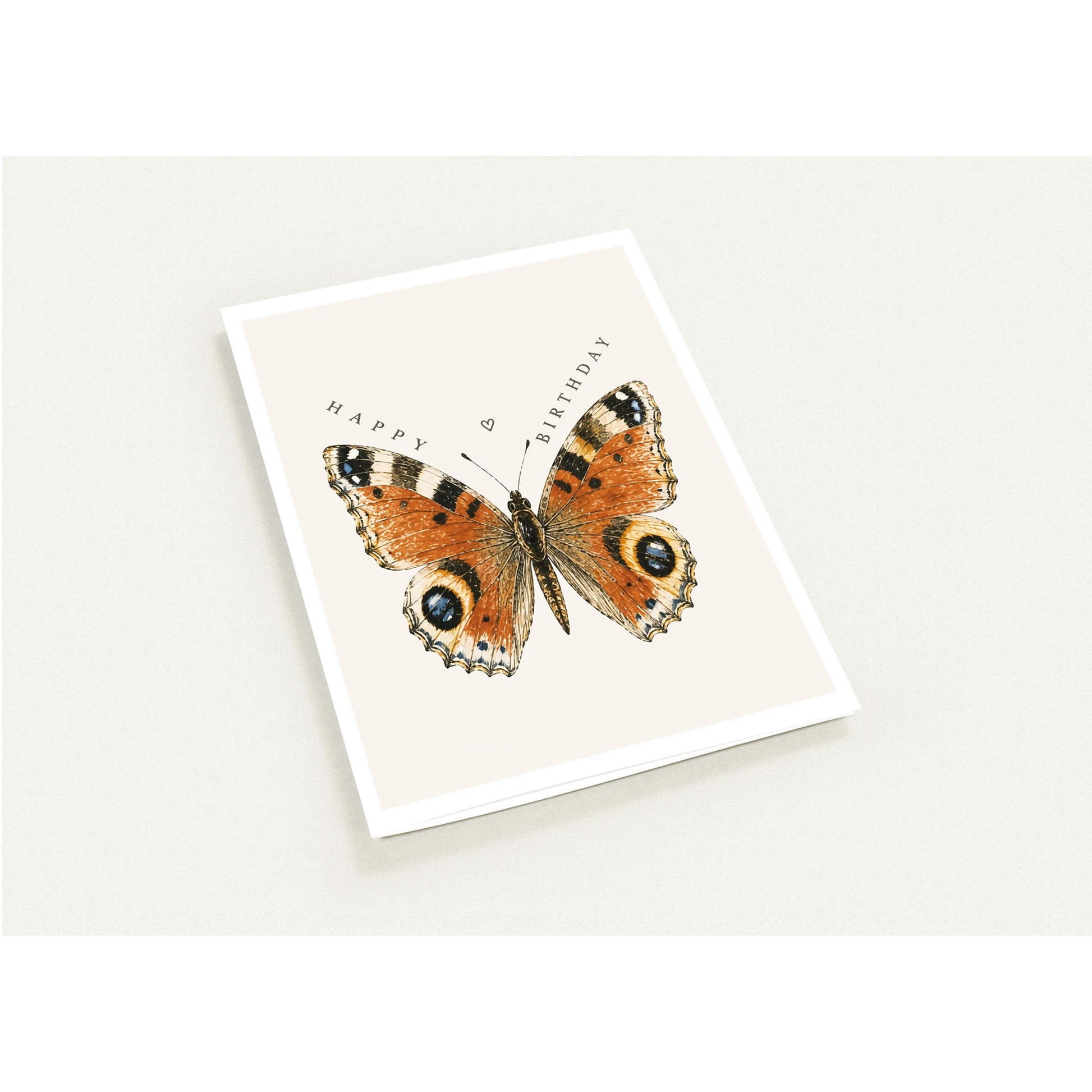 Greeting card with a butterfly illustration and 'Happy Birthday' text on a white background