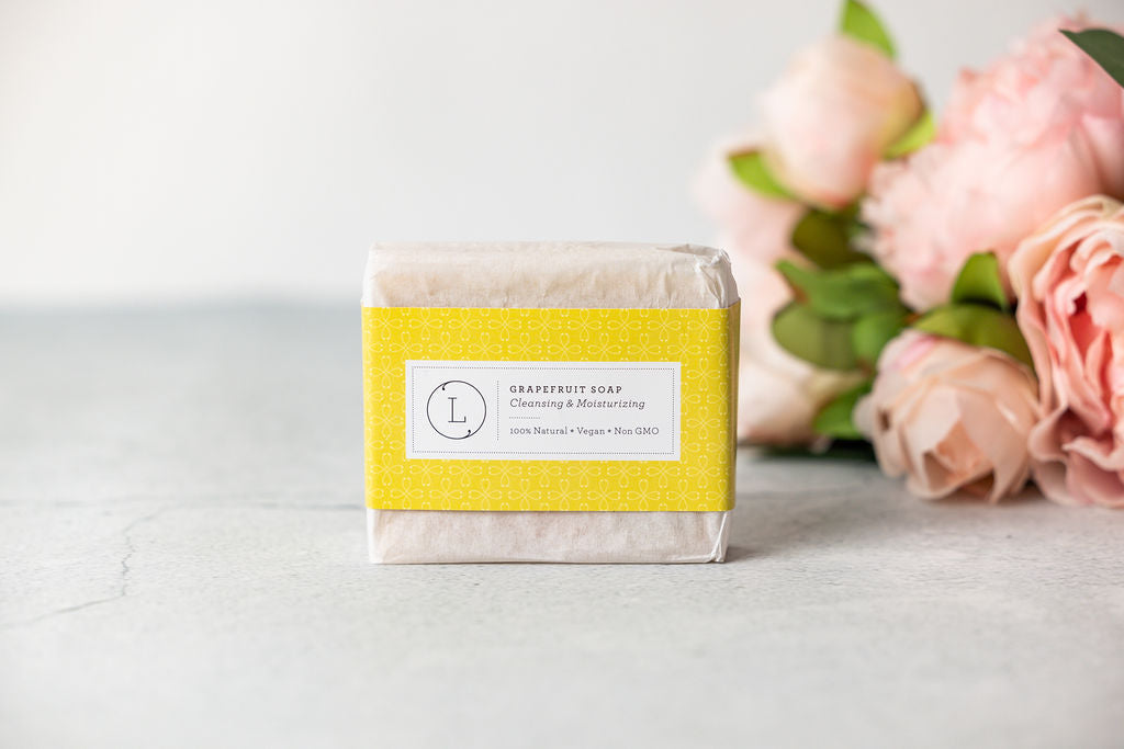 DC-Lizush natural grapefruit soap bar from Citrus Bath & Body Skincare Set, featuring fresh, citrus-scented soap for nourishing skin.