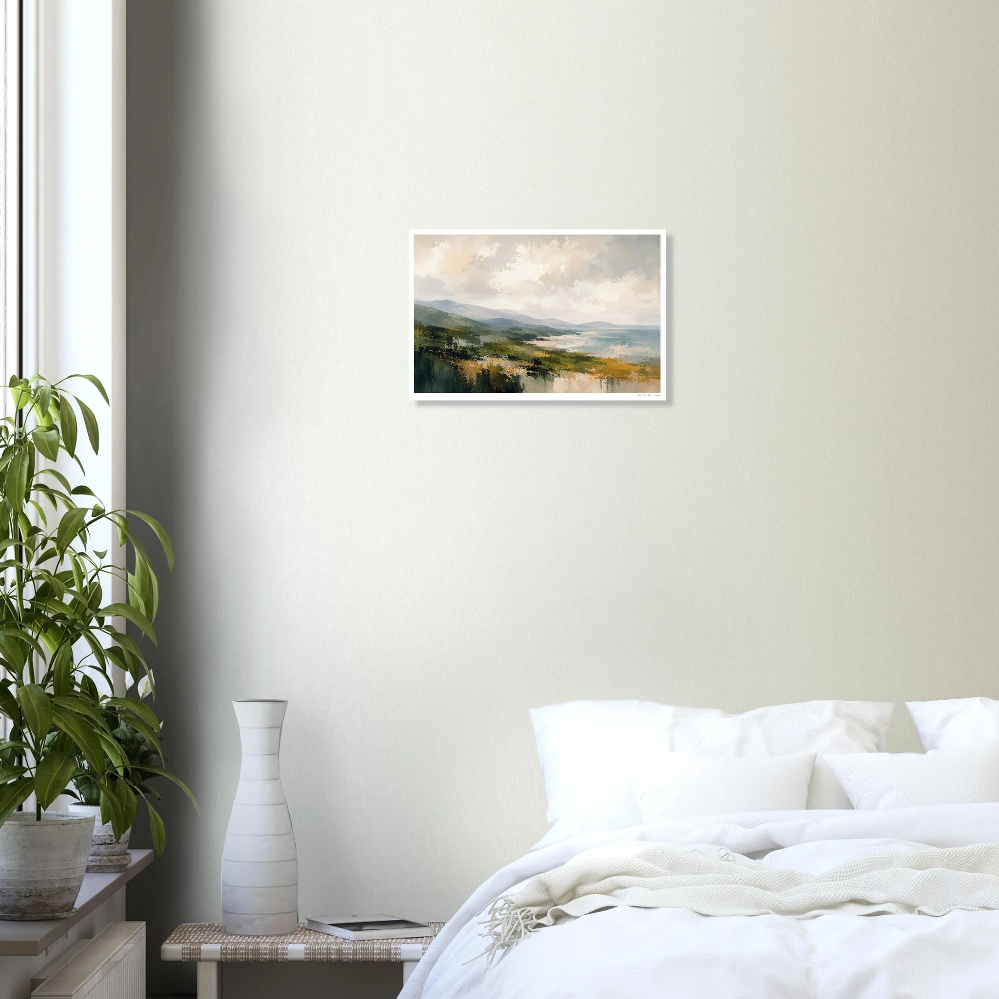 Framed landscape painting on a wall above a bed in a bedroom.