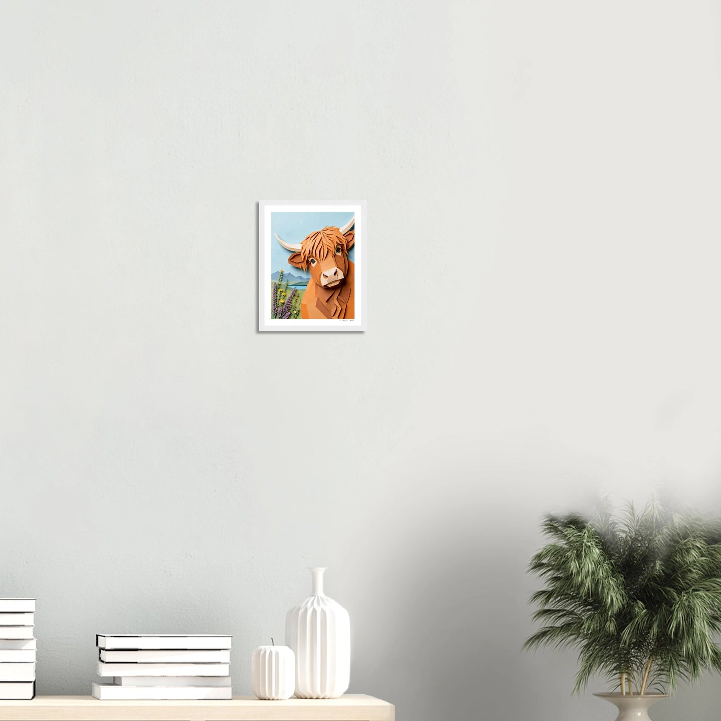 Framed family portrait on a wall with decorative items below